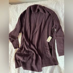 Brand new with tags! Women’s classic fit cardigan. Mid-length and soft!